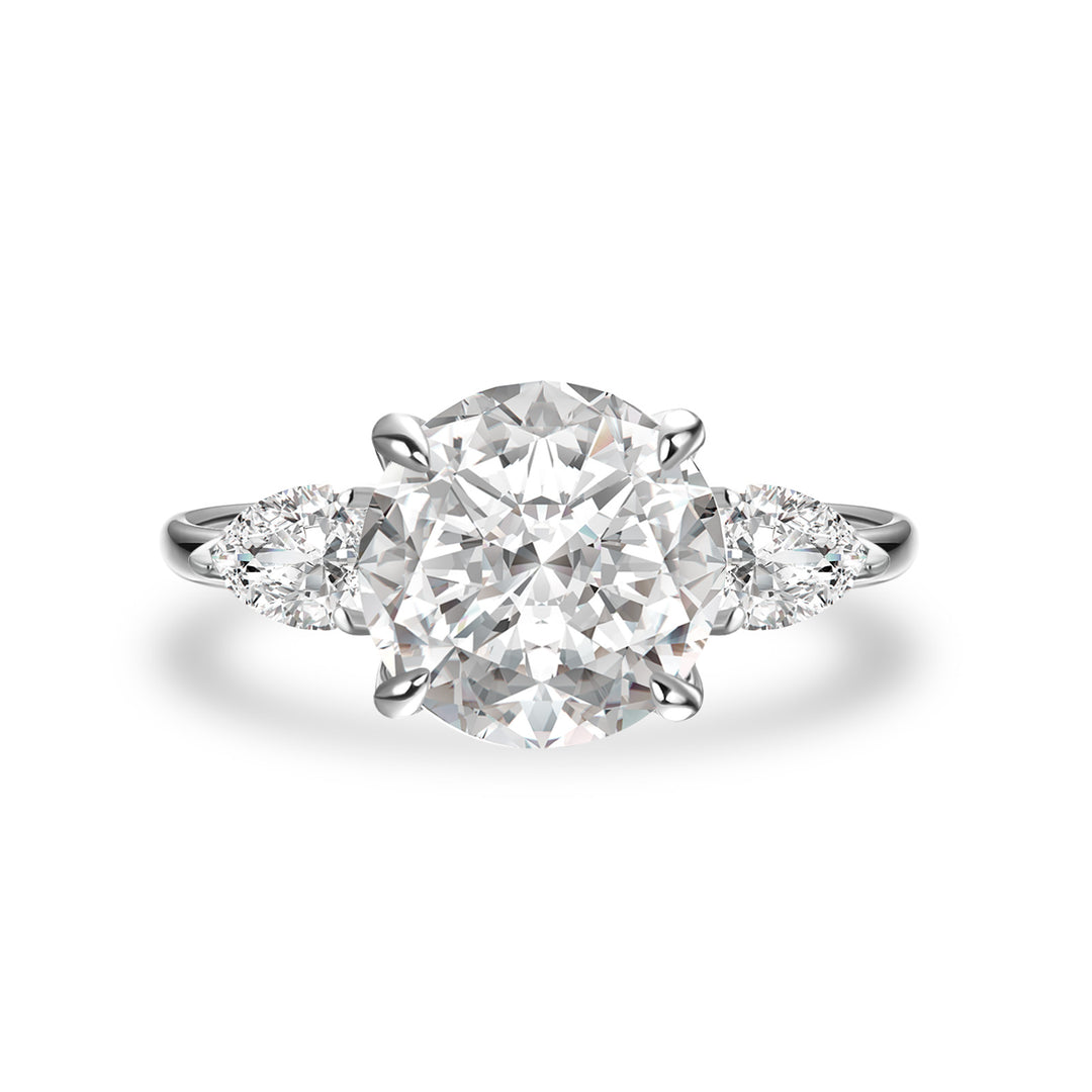 Moissanite 4.0 Ct Round Cut White Gold Engagement Ring with Pear Cut Side Stone