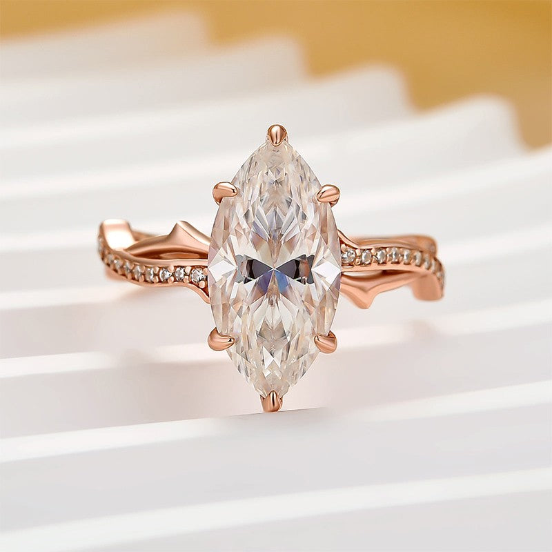 Moissanite 3.0Ct Marquise Cut Rose Gold Twist Engagement Ring In Sterling Silver