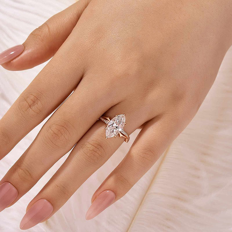Moissanite 3.0Ct Marquise Cut Rose Gold Twist Engagement Ring In Sterling Silver