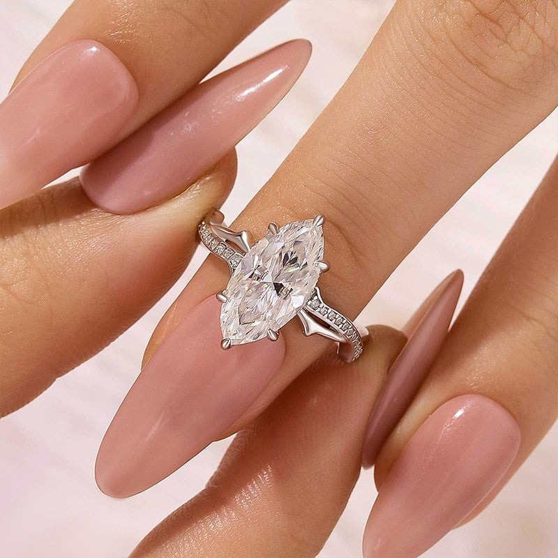 Moissanite 3.0Ct Marquise Cut White Gold Twist Engagement Ring In Sterling Silver