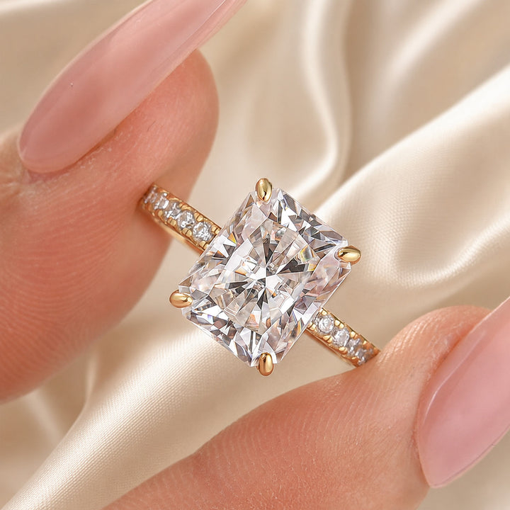 Close-up of a radiant cut side stone engagement ring