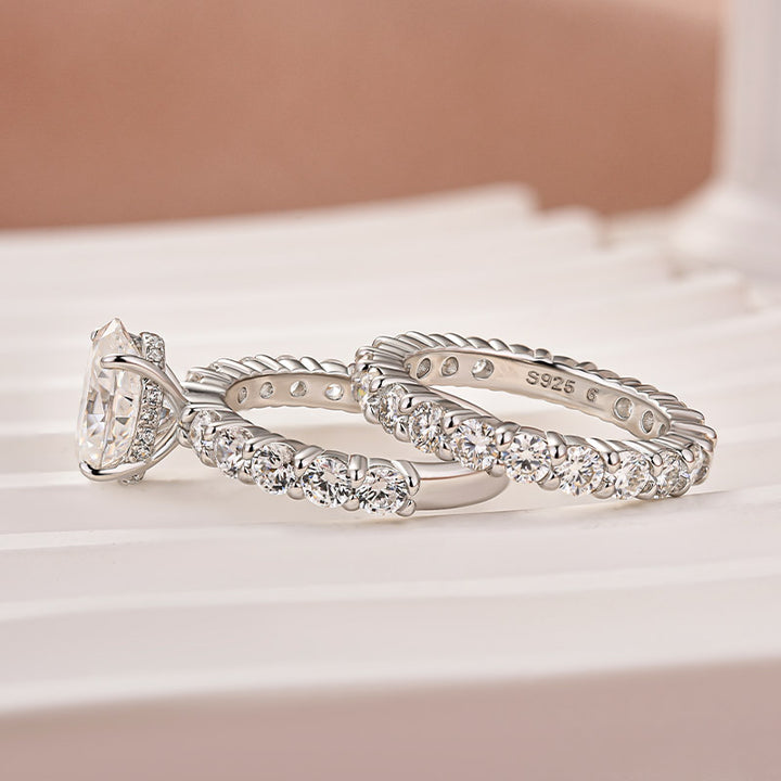 Moissanite 2.5Ct Oval Cut Side Stone White Gold Engagement Ring with Pavé Eternity Ring