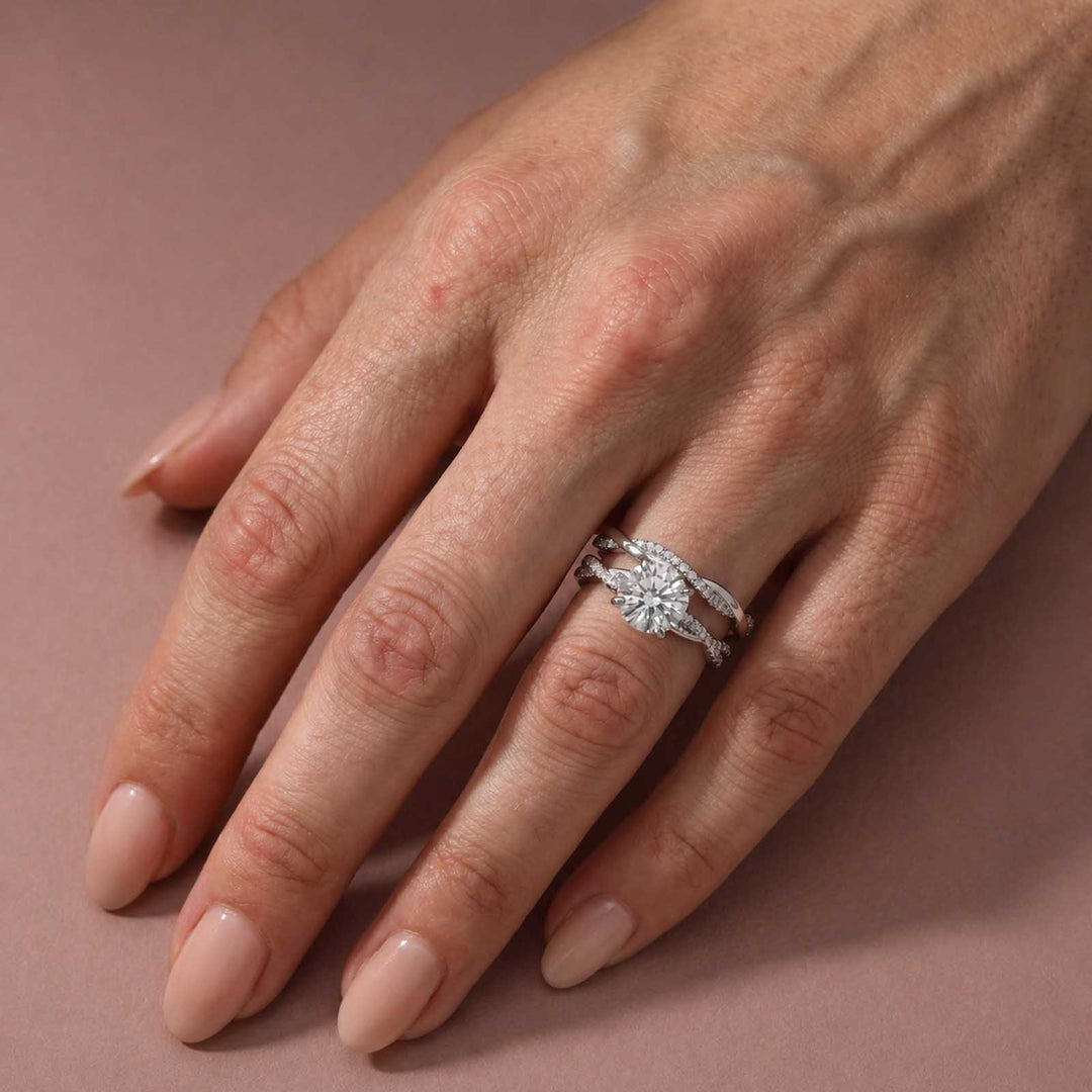 S925 Moissanite Twist 1.0Ct Round Cut 2PC Engagement Ring with 0.22Ct Round Cut Wedding Band