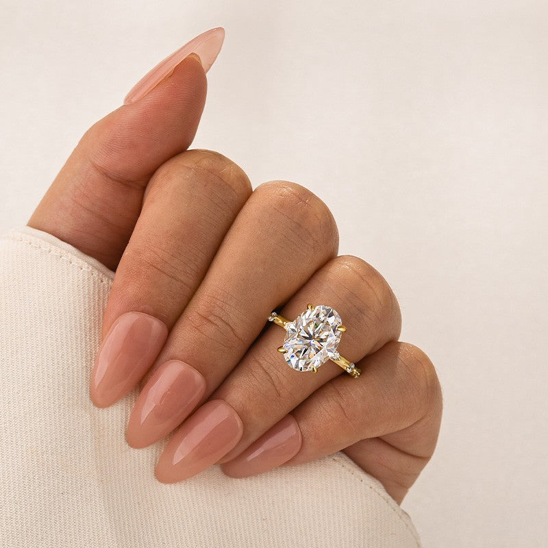 Yellow Gold 5.5 Ct Oval Cut Moissanite Engagement Ring In Sterling Silver