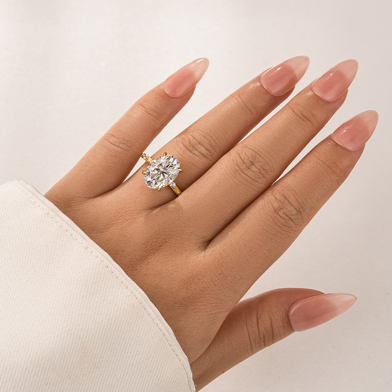 Yellow Gold 5.5 Ct Oval Cut Moissanite Engagement Ring In Sterling Silver