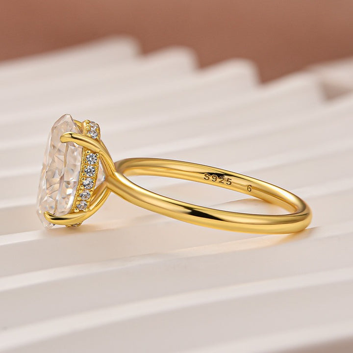 Side profile showing the hidden halo setting and yellow gold band