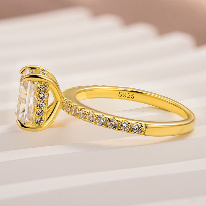 Side profile showing the hidden halo and yellow gold setting