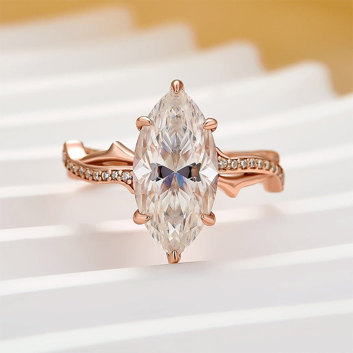 Moissanite 3.0Ct Marquise Cut Rose Gold Twist Engagement Ring In Sterling Silver
