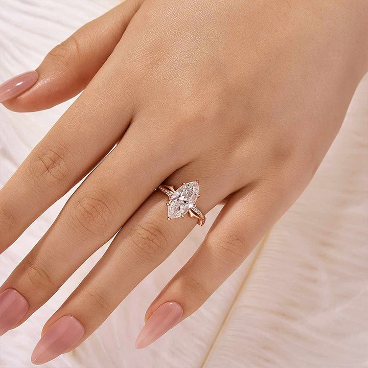 Moissanite 3.0Ct Marquise Cut Rose Gold Twist Engagement Ring In Sterling Silver