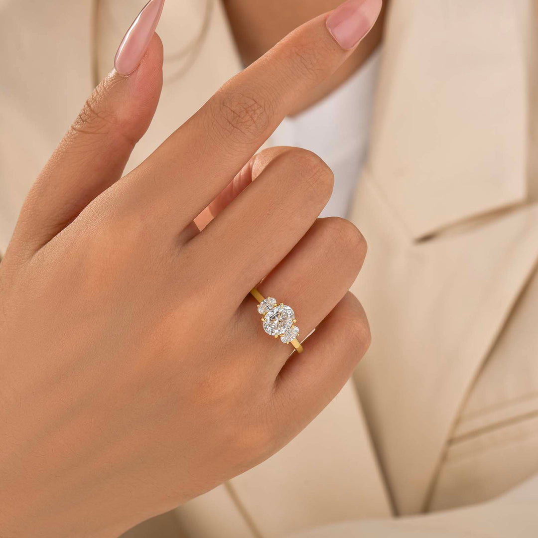 Moissanite 2.0Ct Three Stone Oval Cut 18K Yellow Gold Plated Engagement Ring In Sterling Silver