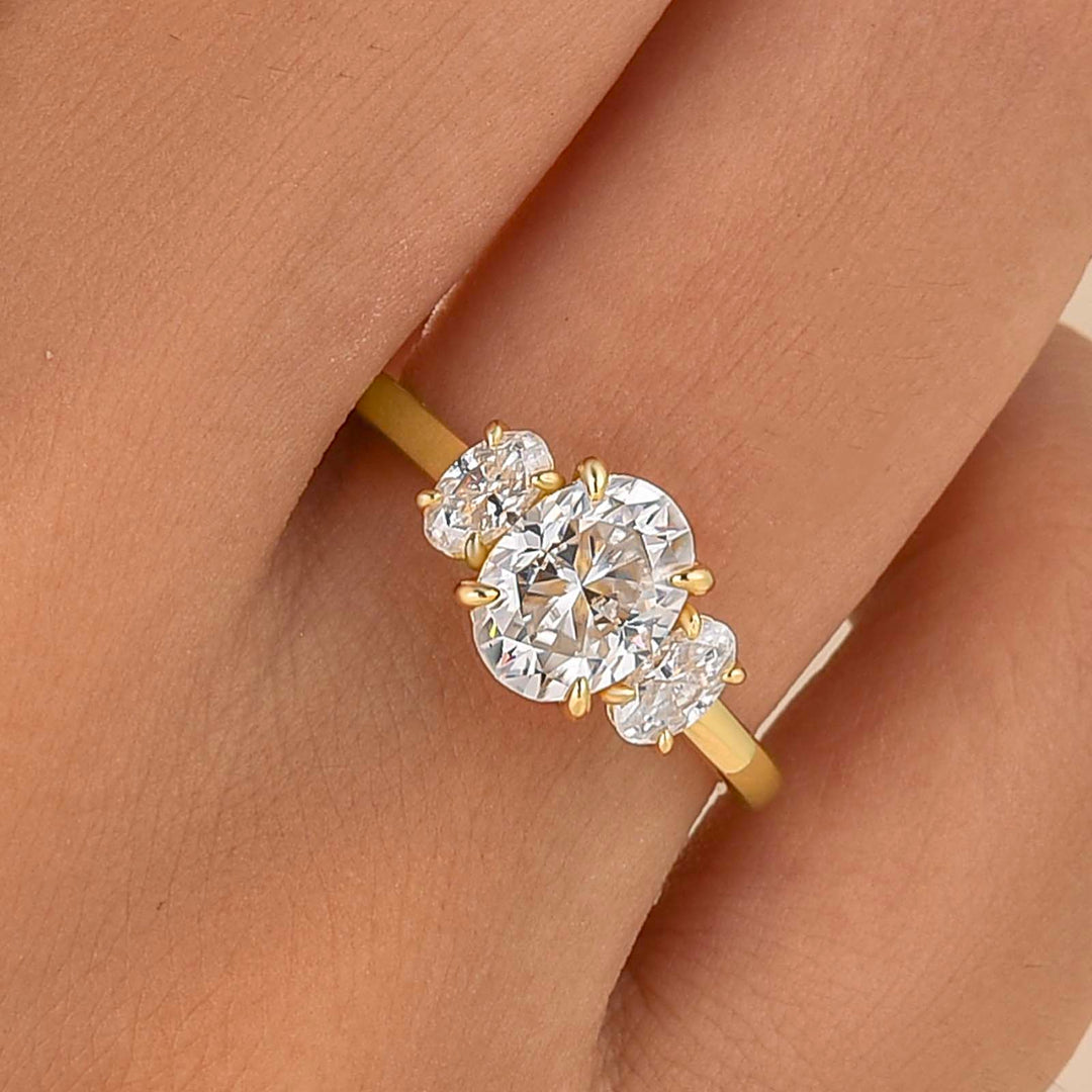 Moissanite 2.0Ct Three Stone Oval Cut 18K Yellow Gold Plated Engagement Ring In Sterling Silver