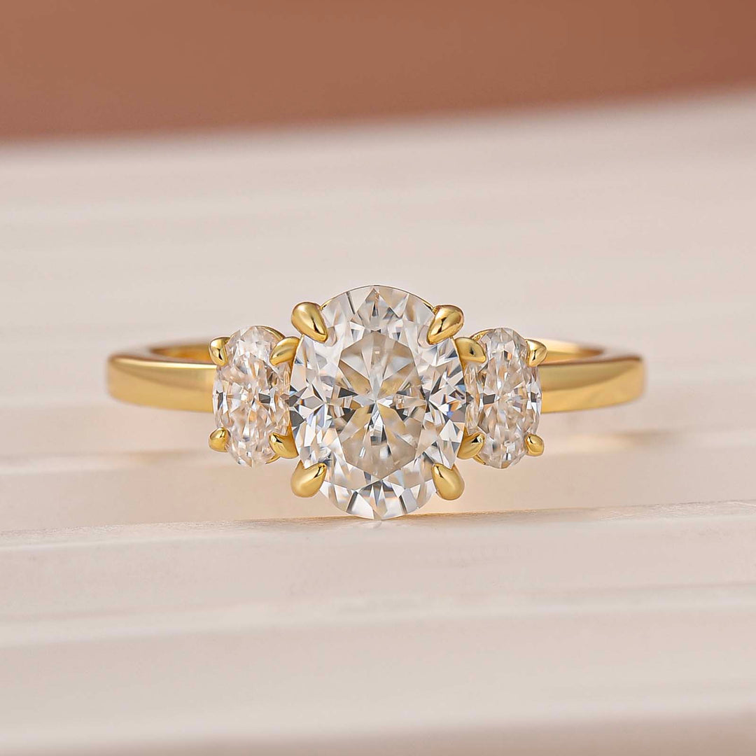 Moissanite 2.0Ct Three Stone Oval Cut 18K Yellow Gold Plated Engagement Ring In Sterling Silver