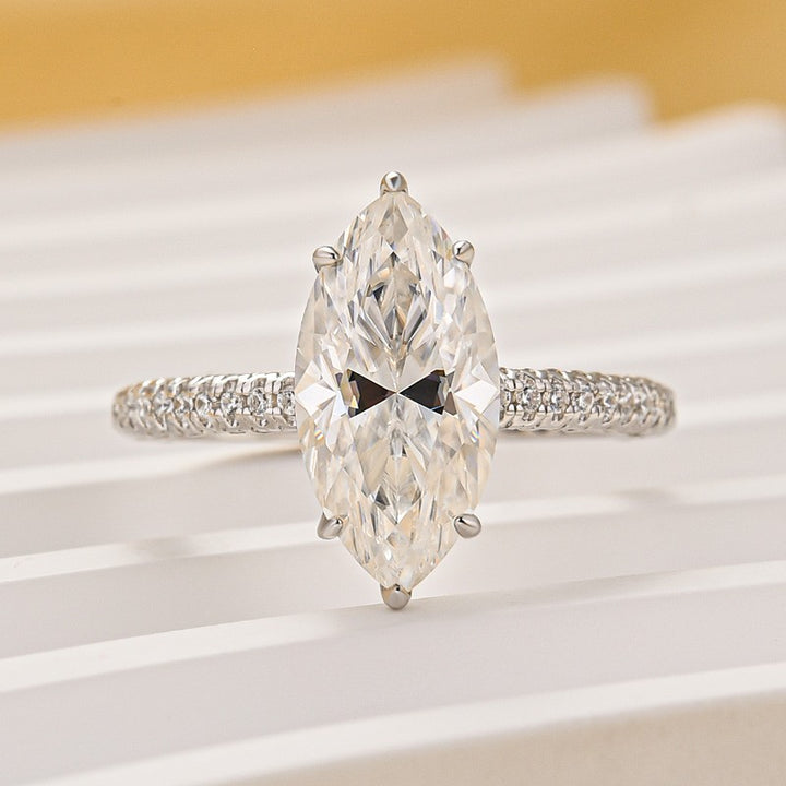 Moissanite 3.0Ct Marquise Cut Solitaire Engagement Ring with Pave Three-Sided Band in 18K White Gold Plated Sterling Silver