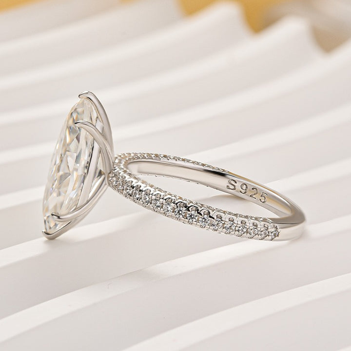 Moissanite 3.0Ct Marquise Cut Solitaire Engagement Ring with Pave Three-Sided Band in 18K White Gold Plated Sterling Silver