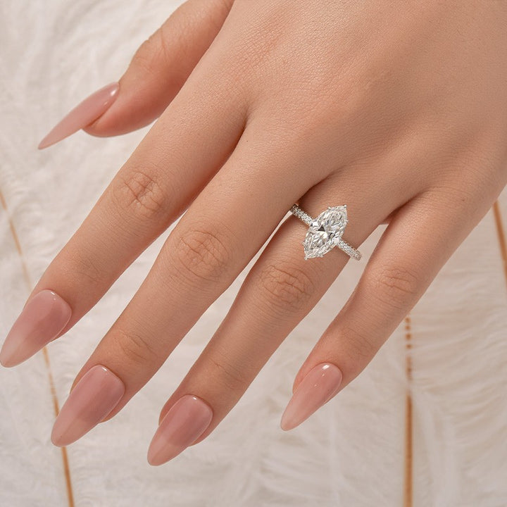 Moissanite 3.0Ct Marquise Cut Solitaire Engagement Ring with Pave Three-Sided Band in 18K White Gold Plated Sterling Silver