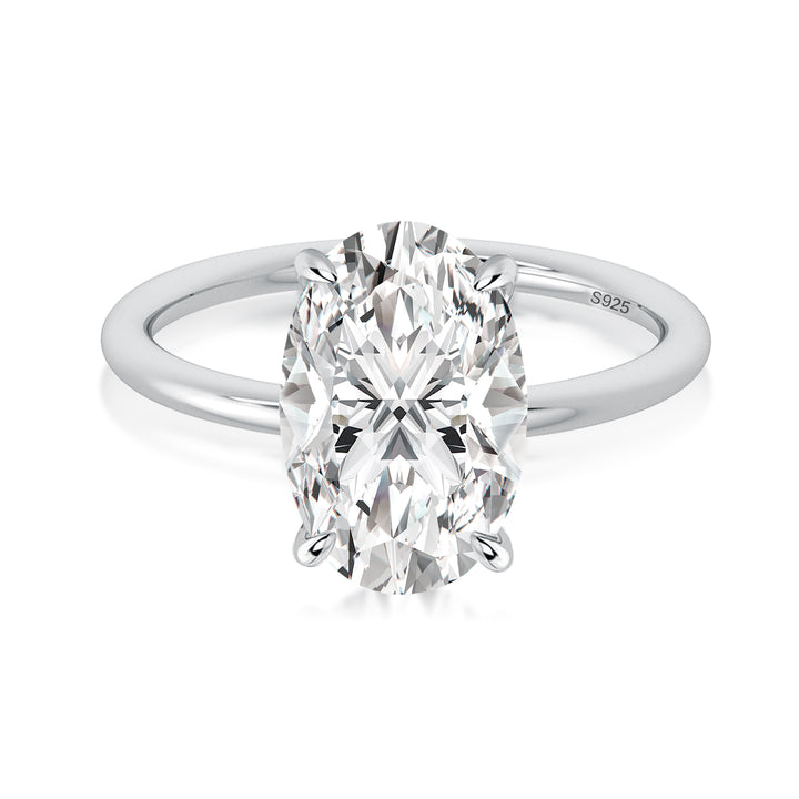 Hidden halo oval moissanite ring in white gold