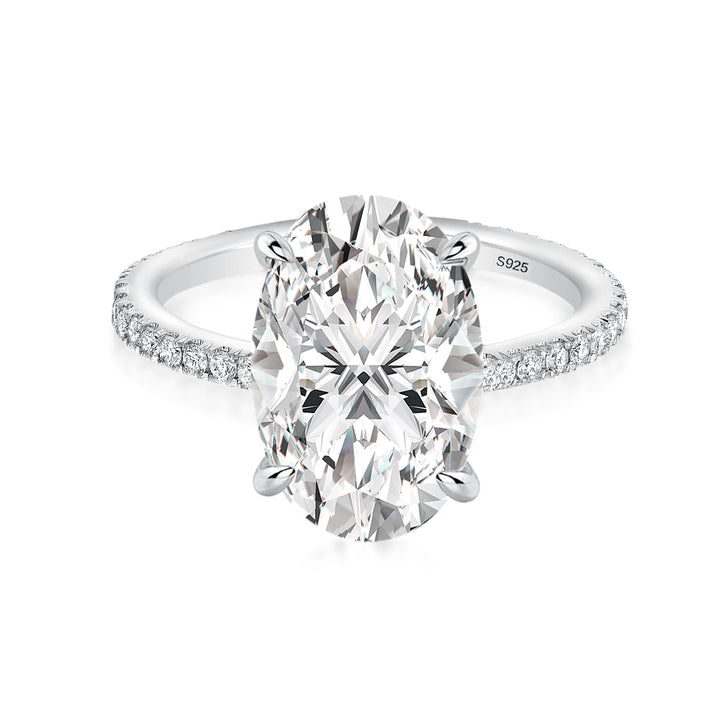 White gold pavé oval moissanite engagement ring