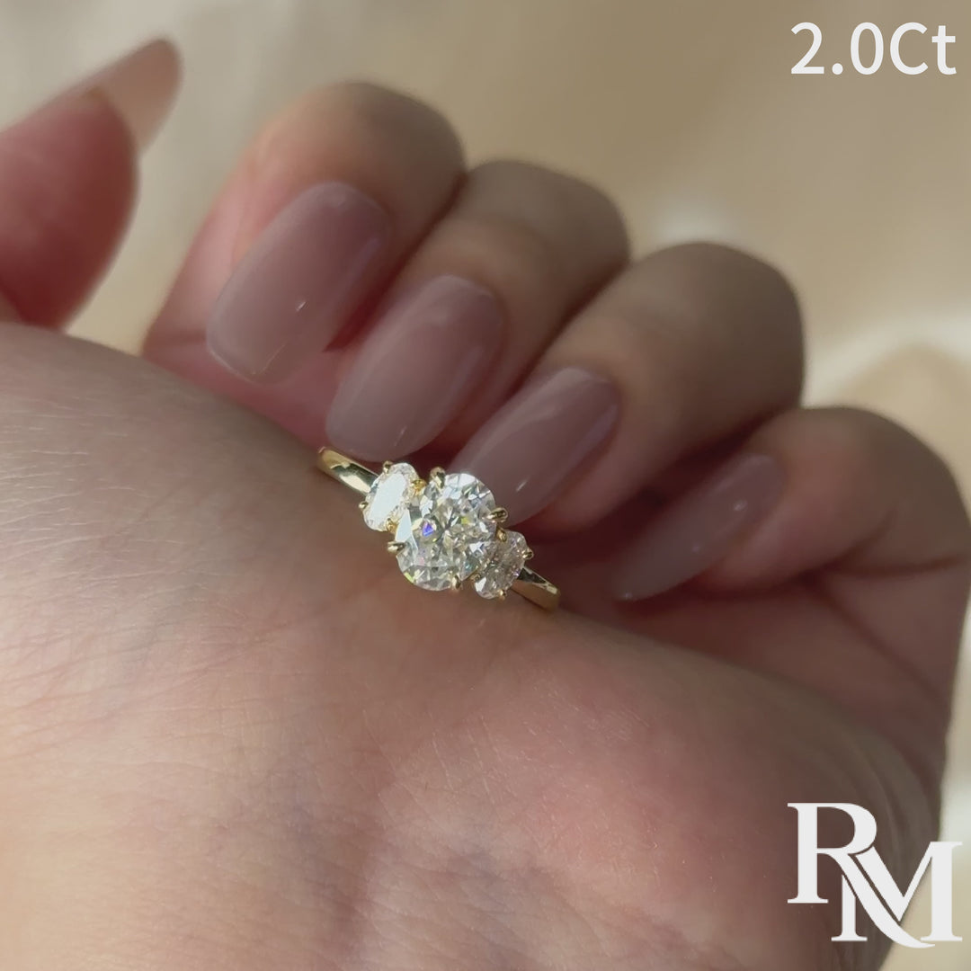 Moissanite 2.0Ct Three Stone Oval Cut 18K Yellow Gold Plated Engagement Ring In Sterling Silver